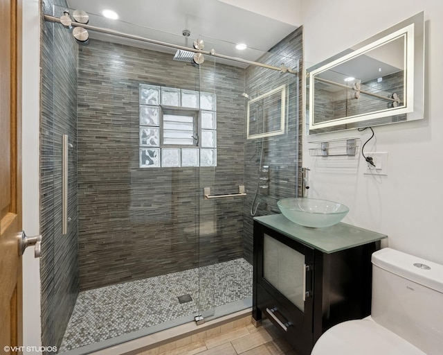4308 N Whipple St, Chicago, IL 60618 - full bath featuring vanity, toilet, a shower stall, and recessed lighting
