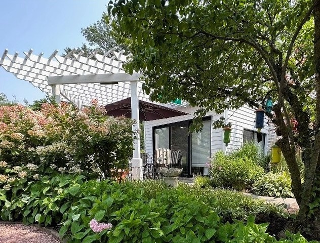 941 Harms Rd, Glenview, IL 60025 - back of house featuring a pergola