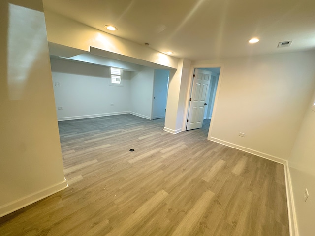 15117 2nd Ave, Phoenix, IL 60426 - basement featuring baseboards, wood finished floors, and recessed lighting