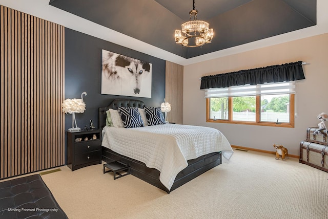 608 W N St, Peotone, IL 60468 - carpeted bedroom featuring a chandelier, baseboards, and a tray ceiling