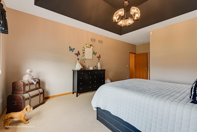 608 W N St, Peotone, IL 60468 - bedroom with light colored carpet, a chandelier, and baseboards