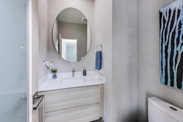 870 Woodbine Rd, Highland Park, IL 60035 - bathroom featuring vanity and toilet