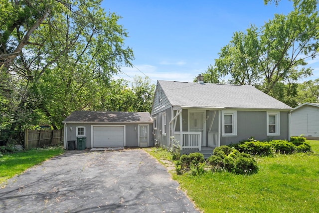 3737 Rose Manor Ter, Markham, IL 60428 - view of front of home with asphalt driveway, a chimney, and a shingled roof