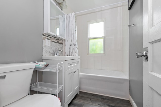 3737 Rose Manor Ter, Markham, IL 60428 - full bathroom featuring toilet, shower / bath combo, vanity, wood finished floors, and backsplash