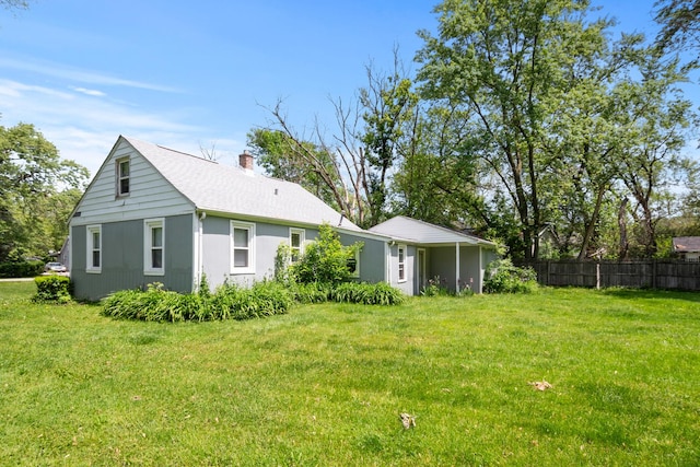 3737 Rose Manor Ter, Markham, IL 60428 - back of house with a chimney and a shingled roof