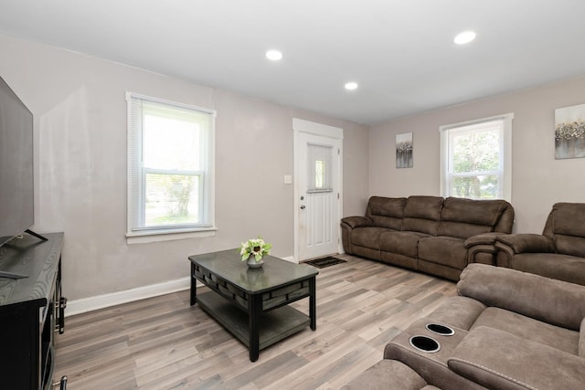 3737 Rose Manor Ter, Markham, IL 60428 - living room featuring light wood finished floors, baseboards, and recessed lighting