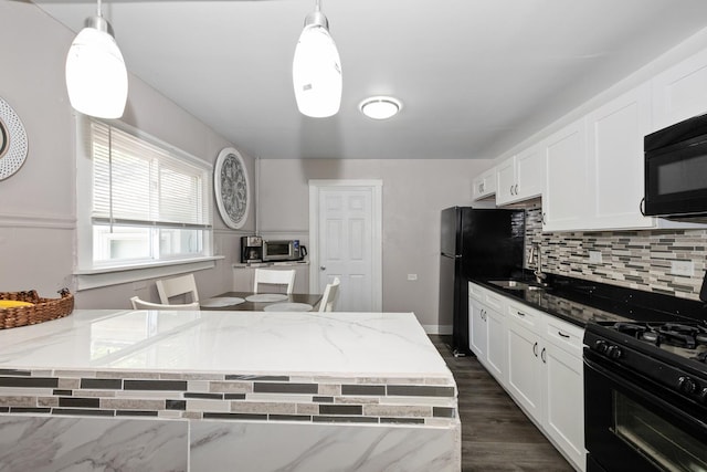 3737 Rose Manor Ter, Markham, IL 60428 - kitchen featuring black appliances, white cabinets, light stone countertops, and tasteful backsplash