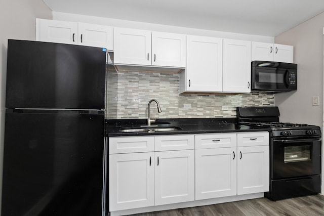 3737 Rose Manor Ter, Markham, IL 60428 - kitchen featuring black appliances, a sink, wood finished floors, white cabinets, and tasteful backsplash