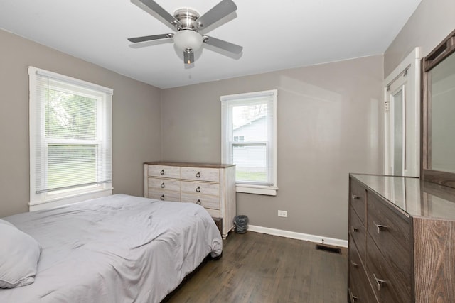 3737 Rose Manor Ter, Markham, IL 60428 - bedroom with dark wood-style floors, baseboards, multiple windows, and ceiling fan