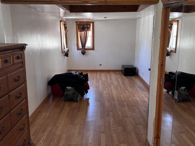 2177 N Merrimac Ave, Chicago, IL 60639 - basement featuring light wood-type flooring and baseboards