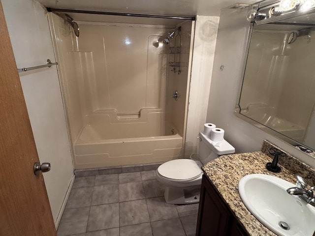 2177 N Merrimac Ave, Chicago, IL 60639 - full bathroom with tile patterned floors, vanity, toilet, shower / bath combination, and baseboards