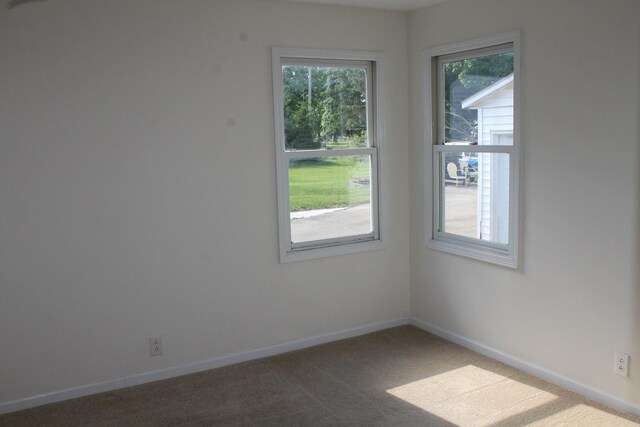 517 Victor St, Sycamore, IL 60178 - carpeted empty room with baseboards