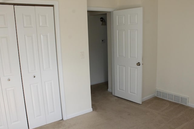 517 Victor St, Sycamore, IL 60178 - unfurnished bedroom featuring carpet flooring, baseboards, and a closet