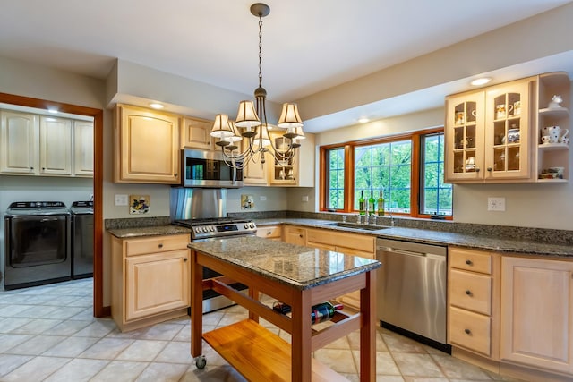 215 Hilltop Ln, Sleepy Hollow, IL 60118 - kitchen with stainless steel appliances, washer and dryer, light brown cabinetry, and recessed lighting
