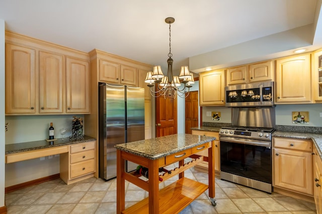 215 Hilltop Ln, Sleepy Hollow, IL 60118 - kitchen featuring appliances with stainless steel finishes, light brown cabinets, a chandelier, and decorative light fixtures