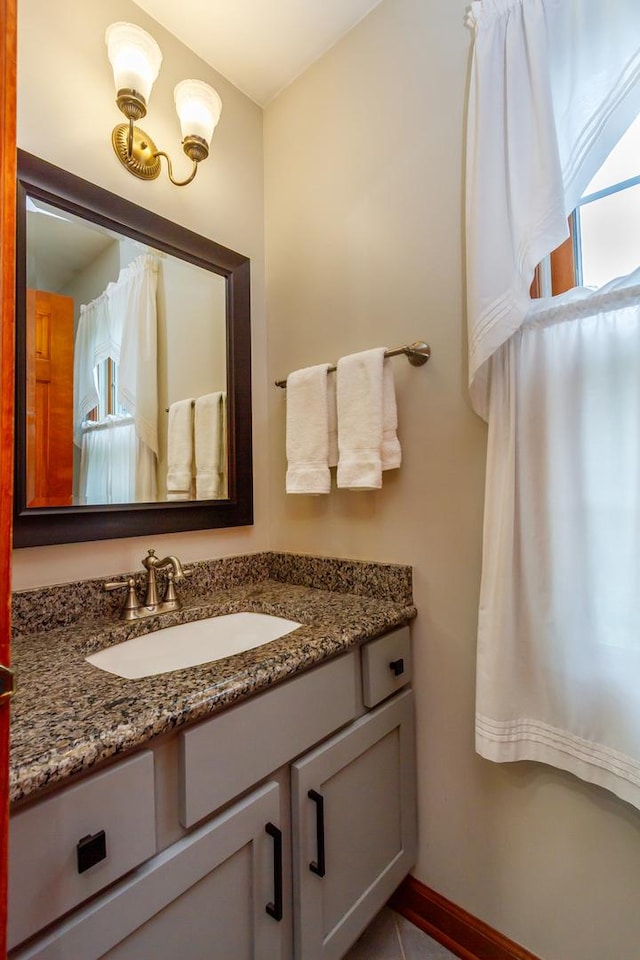 215 Hilltop Ln, Sleepy Hollow, IL 60118 - bathroom featuring vanity and baseboards