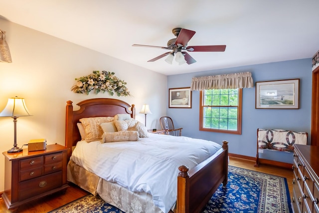 215 Hilltop Ln, Sleepy Hollow, IL 60118 - bedroom with dark wood-style flooring, baseboards, and ceiling fan