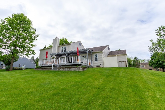 215 Hilltop Ln, Sleepy Hollow, IL 60118 - rear view of property featuring a pergola, a deck, a lawn, and a chimney