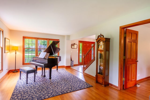 215 Hilltop Ln, Sleepy Hollow, IL 60118 - sitting room featuring wood finished floors, baseboards, and stairs