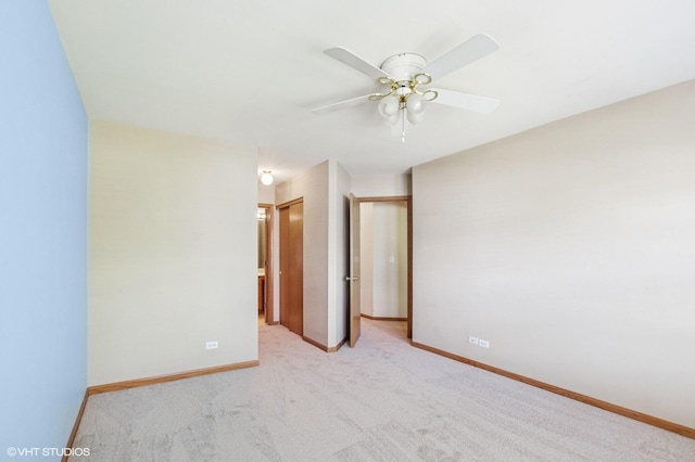 2258 Reflections Dr Unit 2258, Aurora, IL 60502 - spare room with a ceiling fan, baseboards, and carpet floors