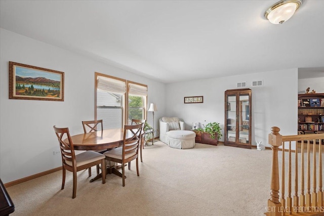 1705 Heatherstone Ave, Montgomery, IL 60538 - dining room featuring light carpet and baseboards