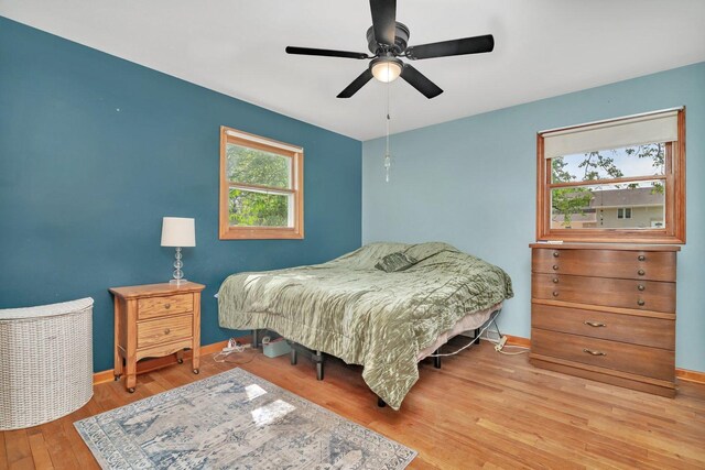 207 Redwood Ave, New Lenox, IL 60451 - bedroom with wood finished floors, baseboards, and a ceiling fan