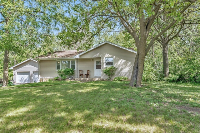 207 Redwood Ave, New Lenox, IL 60451 - view of front of home featuring a garage, an outbuilding, and a front lawn