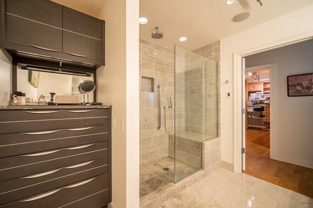 340 E Randolph St Unit 4703, Chicago, IL 60601 - bathroom featuring a stall shower, vanity, recessed lighting, and baseboards
