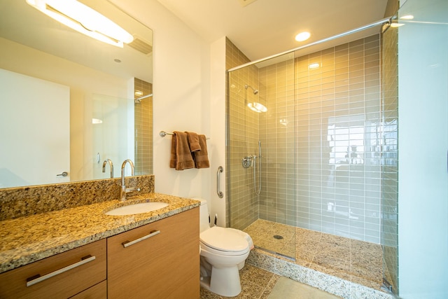 340 E Randolph St Unit 4703, Chicago, IL 60601 - full bathroom featuring toilet, a stall shower, vanity, recessed lighting, and tile patterned flooring
