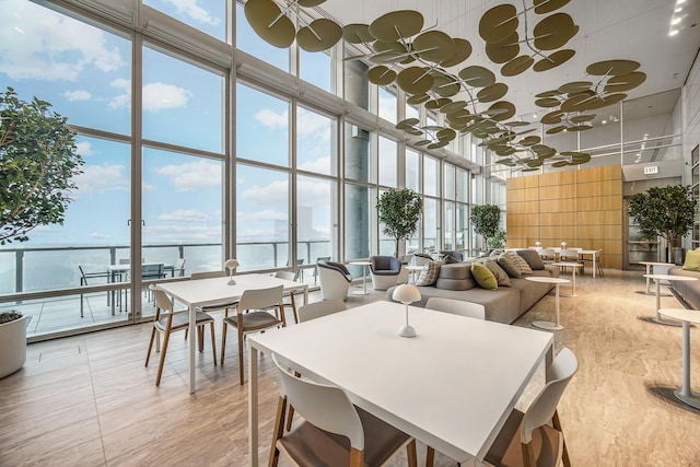 340 E Randolph St Unit 4703, Chicago, IL 60601 - common area featuring floor to ceiling windows, a high ceiling, and a water view