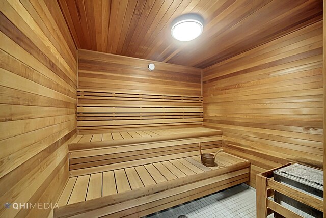 340 E Randolph St Unit 4703, Chicago, IL 60601 - relaxing sauna / steam room featuring wood walls and tile patterned floors