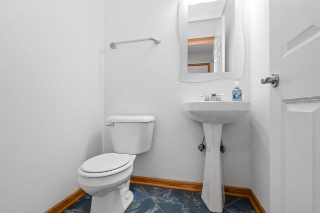 9403 Saratoga Ct, Hickory Hills, IL 60457 - half bathroom featuring toilet, baseboards, and tile patterned flooring