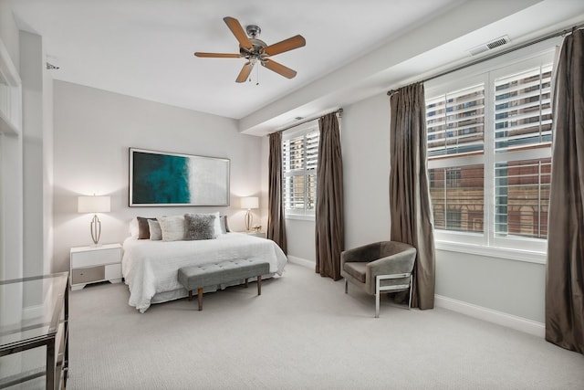 30 W Erie St Unit 402, Chicago, IL 60654 - bedroom with carpet floors, baseboards, and a ceiling fan
