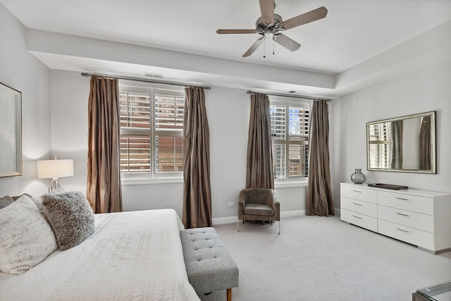 30 W Erie St Unit 402, Chicago, IL 60654 - bedroom with light carpet, baseboards, and a ceiling fan