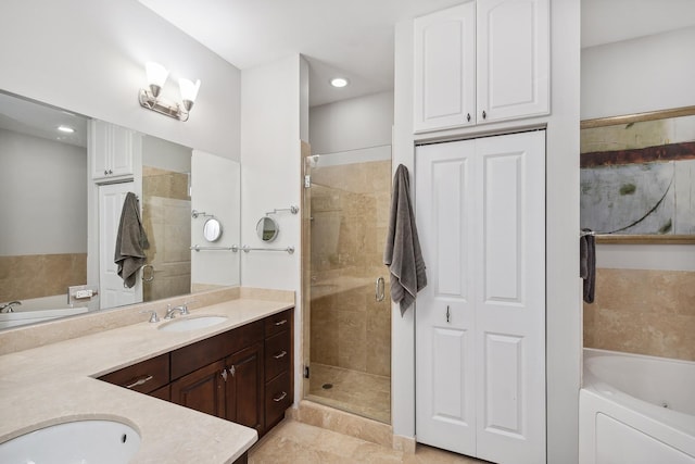 30 W Erie St Unit 402, Chicago, IL 60654 - bathroom with double vanity, a garden tub, a stall shower, and recessed lighting