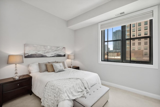 30 W Erie St Unit 402, Chicago, IL 60654 - bedroom with carpet flooring and baseboards