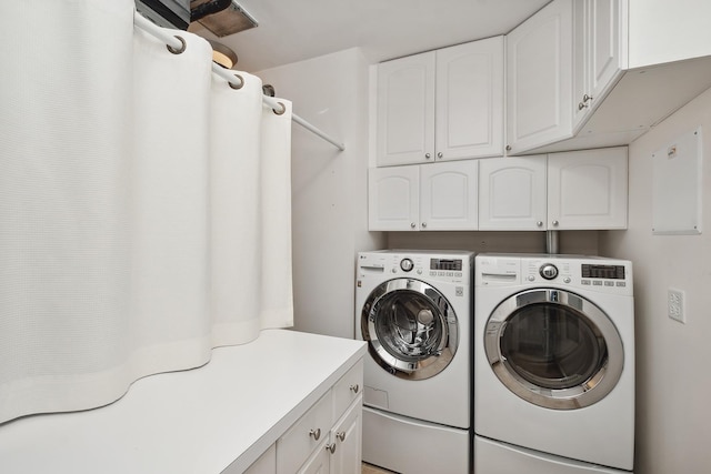 30 W Erie St Unit 402, Chicago, IL 60654 - washroom with cabinet space and washer and clothes dryer