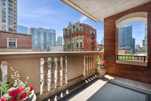 30 W Erie St Unit 402, Chicago, IL 60654 - balcony featuring a view of skyline