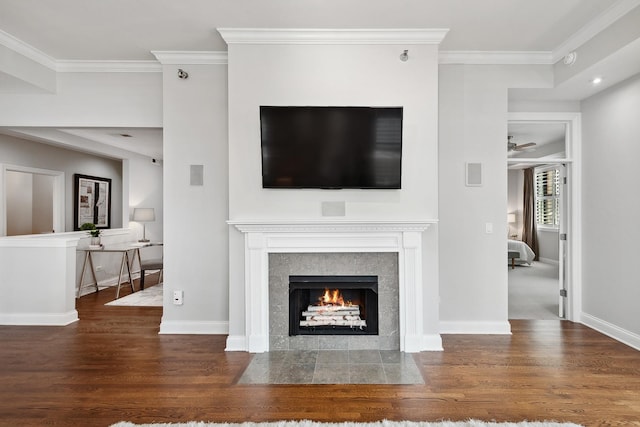 30 W Erie St Unit 402, Chicago, IL 60654 - unfurnished living room with wood finished floors, a fireplace with flush hearth, ornamental molding, ceiling fan, and baseboards