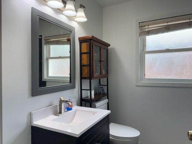 14812 S Wabash Ave, Dolton, IL 60419 - bathroom featuring toilet and vanity