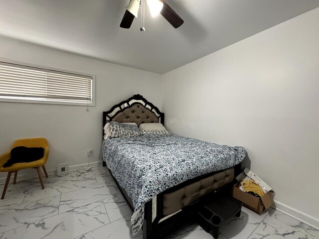 14812 S Wabash Ave, Dolton, IL 60419 - bedroom with marble look tile flooring, baseboards, and ceiling fan