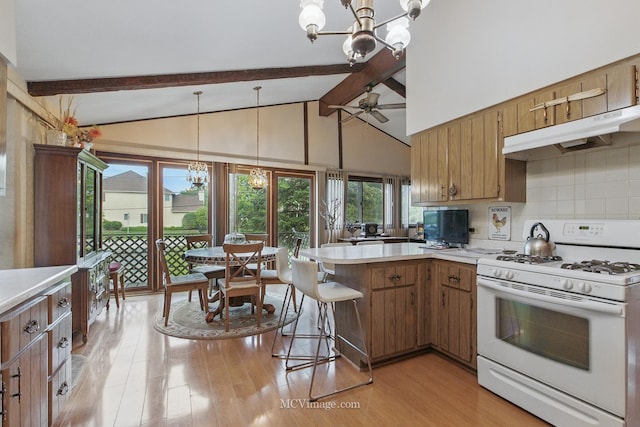 6542 S Ridge Rd, Willowbrook, IL 60527 - kitchen featuring white gas range oven, a chandelier, beam ceiling, under cabinet range hood, and light wood-style flooring