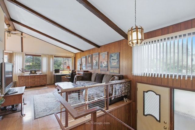 6542 S Ridge Rd, Willowbrook, IL 60527 - living area featuring wooden walls, a chandelier, and light wood-type flooring