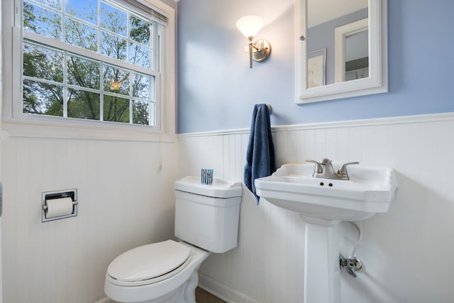 25W303 Gunston Ave, Naperville, IL 60540 - half bath with plenty of natural light, toilet, and a wainscoted wall