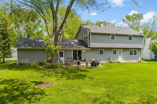 25W303 Gunston Ave, Naperville, IL 60540 - rear view of house featuring a patio area, a yard, a chimney, and roof with shingles