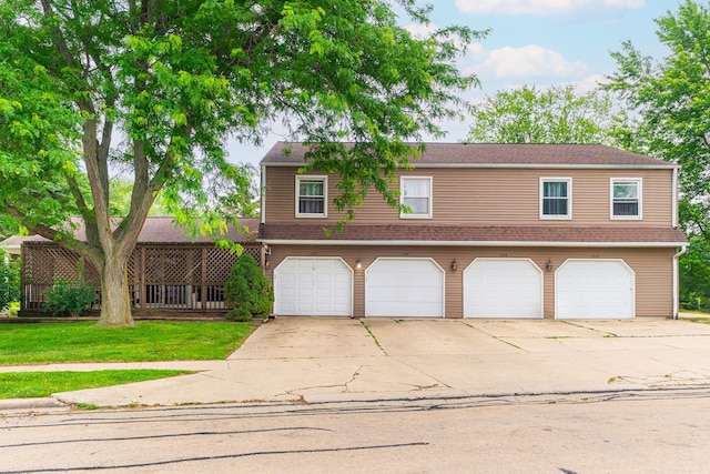 1532 E Stonehenge Drive -, Sycamore, IL 60178 - view of front facade with driveway, an attached garage, and a front lawn