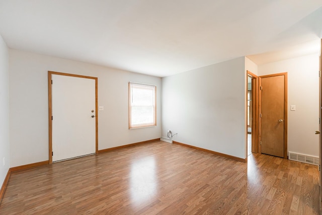 1532 E Stonehenge Drive -, Sycamore, IL 60178 - empty room featuring wood finished floors and baseboards