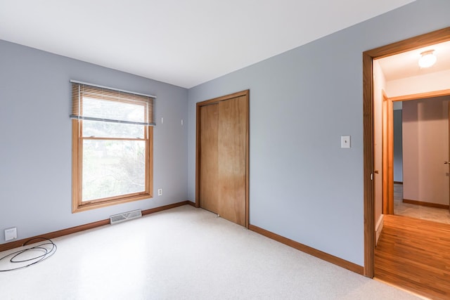 1532 E Stonehenge Drive -, Sycamore, IL 60178 - unfurnished bedroom featuring baseboards and a closet