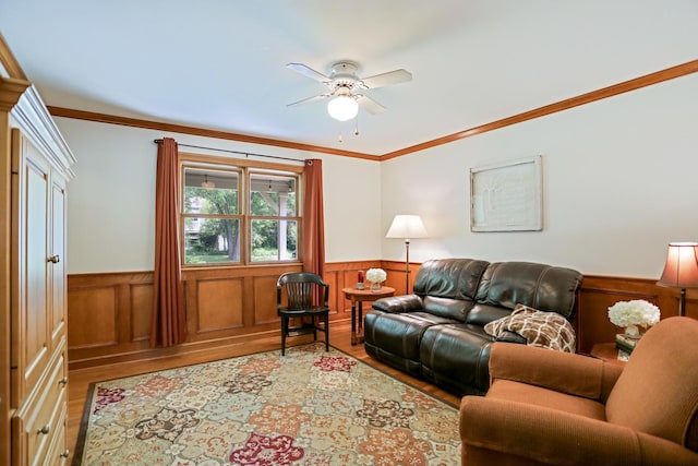 611 S 10th Ave, Saint Charles, IL 60174 - living room with wood finished floors, a wainscoted wall, ceiling fan, and crown molding