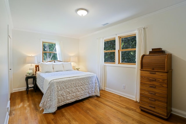 611 S 10th Ave, Saint Charles, IL 60174 - bedroom featuring wood finished floors and ornamental molding